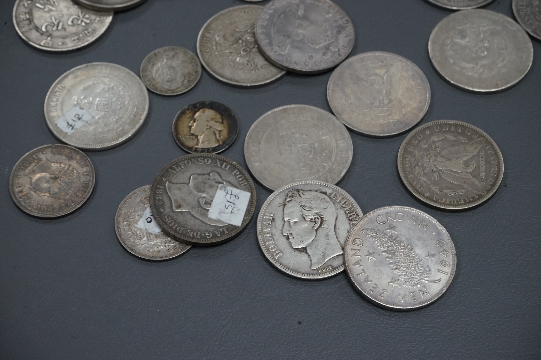 A collection of Chinese, France, Italy silver and coins and other world silver coins, late 19th/20th century